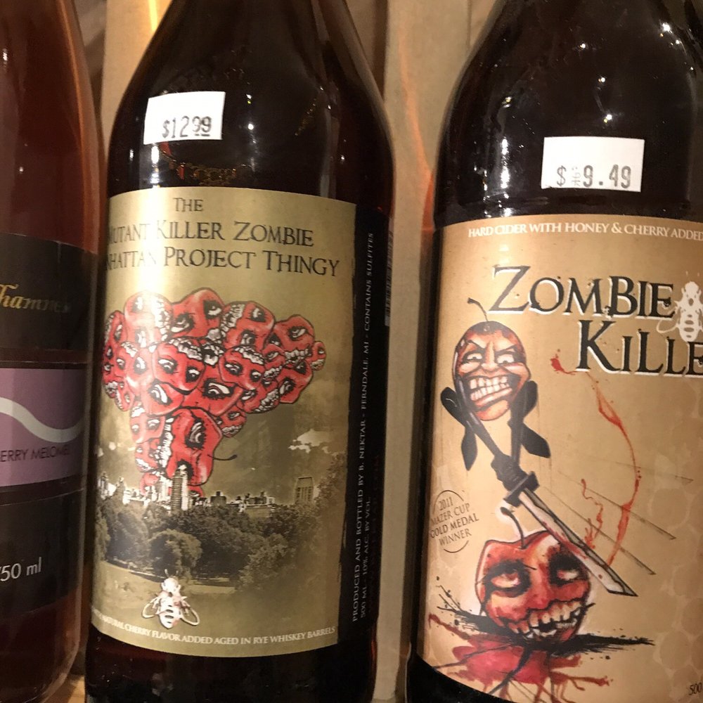 Grog Shop - three bottles of wine on a shelf - Beer, Wine & Spirits Near Me - Homer, Alaska