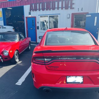 Sig's Automotive - Front of Sigs with a fiat and a charger 392 Hemi - Auto Repair Near Me - O'fallon, Missouri Sig's Automotive - Front of Sigs with a fiat and a charger 392 Hemi - Auto Repair Near Me - O'fallon, Missouri