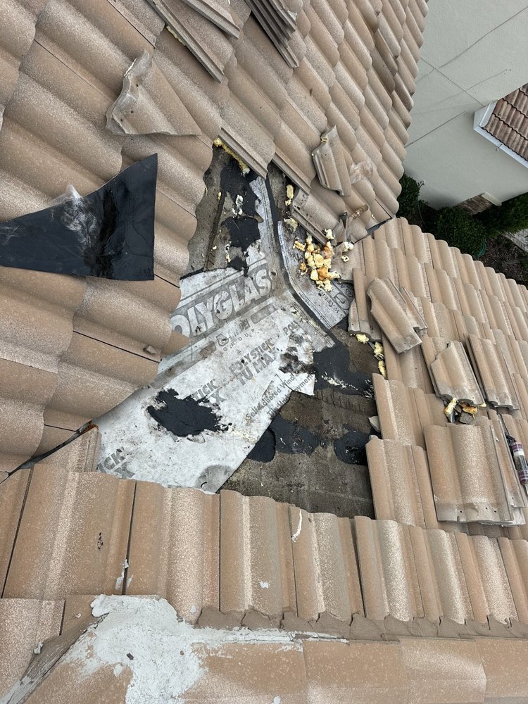 Slide of Tampa Roof Repair