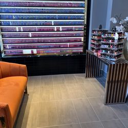 JB Nails & Spa - Nail colors to choose from, gel on the wall, nail polish to the right