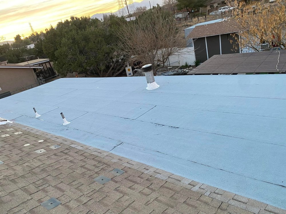 Slide of Tolenco Roofing