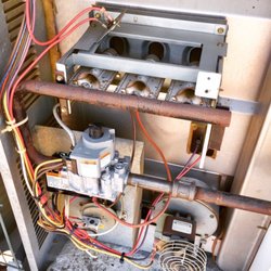 Empire Heating and Cooling - This system is almost 30 years old! With proper service year after year, it almost looks new.