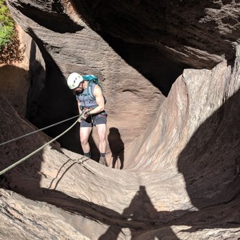Zion Mountaineering School - My friend rappelling down the second rappel of the canyoneering portion of our tour - Climbing Near Me - Springdale, Utah Zion Mountaineering School - My friend rappelling down the second rappel of the canyoneering portion of our tour - Climbing Near Me - Springdale, Utah