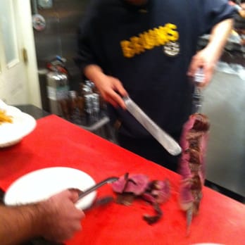 Oliveira's - The first round. Flank steak right off the skewer. - Brazilian Near Me - Everett, Massachusetts