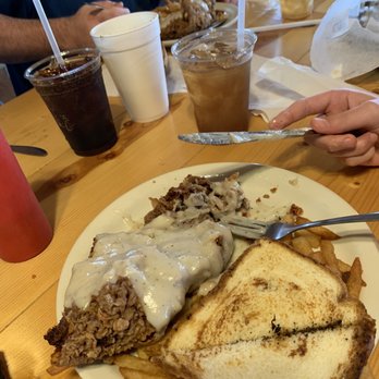 Brew D Brewhouse - Chicken fried steak covered with milk gravy, with Texas toast and French fries. - Breweries Near Me - San Saba, Texas