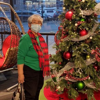 Tru by Hilton Lehi - Grandma posing in the lobby of a great decorated Hotel we stayed at in December. - Hotels Near Me - Lehi, Utah Tru by Hilton Lehi - Grandma posing in the lobby of a great decorated Hotel we stayed at in December. - Hotels Near Me - Lehi, Utah