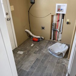 Sparkling Clean Housekeeping - Before image of laundry room.
