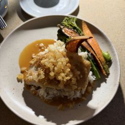 Macadamia Crusted Kampachi. This was the Early Bird Special including salad and dessert Macadamia Crusted Kampachi. This was the Early Bird Special including salad and dessert