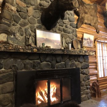 Shoshone Lodge - The Restaurant fireplace - Hotels Near Me - Cody, Wyoming Shoshone Lodge - The Restaurant fireplace - Hotels Near Me - Cody, Wyoming