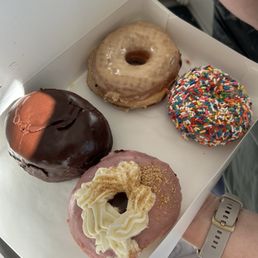 Boston cream, maple, sprinkle, raspberry cheesecake