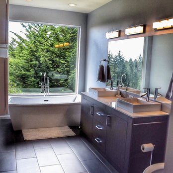 Finish Cuts Construction - a bathroom with a large window - General Contractors Near Me Finish Cuts Construction - a bathroom with a large window - General Contractors Near Me