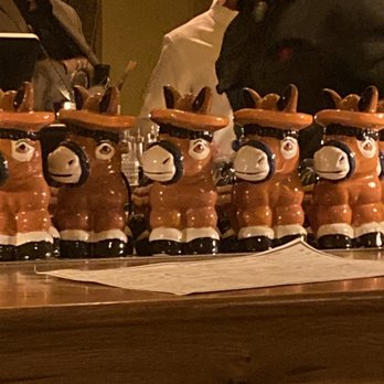 The Hideaway - Cocktail donkey holders set up in the bar area - Steakhouses Near Me - Beverly Hills, California