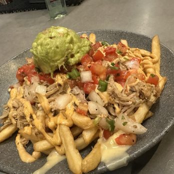 The Surf Club Oceanside - Carnitas dirty fries with Queso, guac, pico and chipotle aioli, - Lounges Near Me - Oceanside, California