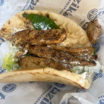 Taziki's Mediterranean Cafe - Bartlett - Grilled Chicken Gyro is decent bread kind of tuff, chicken almost no flavor, tiki sauce is ok. A pinch of salt in everything wouldn't hurt. - Mediterranean Near Me - Memphis, Tennessee Taziki's Mediterranean Cafe - Bartlett - Grilled Chicken Gyro is decent bread kind of tuff, chicken almost no flavor, tiki sauce is ok. A pinch of salt in everything wouldn't hurt. - Mediterranean Near Me - Memphis, Tennessee