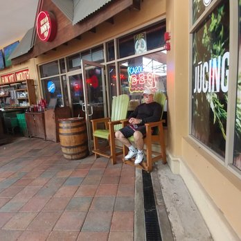 One America Rehab Solution - a woman sitting in a chair outside a restaurant - General Contractors Near Me - Davenport, Florida One America Rehab Solution - a woman sitting in a chair outside a restaurant - General Contractors Near Me - Davenport, Florida