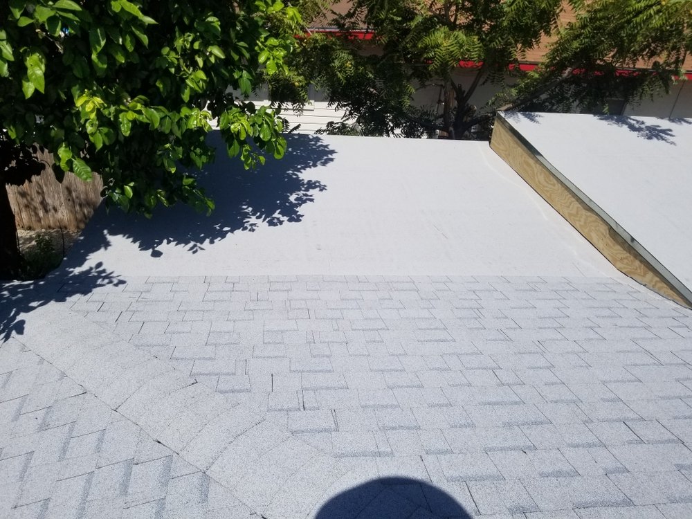 Slide of Monumental Roofing Services