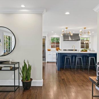 RB Precision Builders - a living room and kitchen - General Contractors Near Me