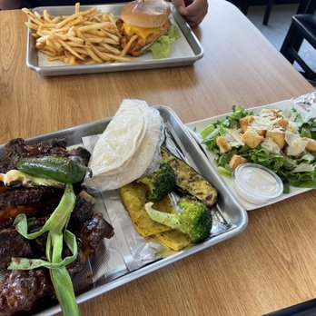 The Carbon Grill - two trays of food on a table - Mexican Near Me - Los Angeles, California The Carbon Grill - two trays of food on a table - Mexican Near Me - Los Angeles, California