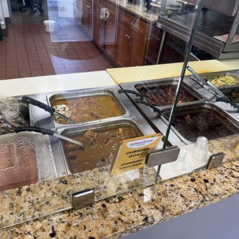 Golden Krust Caribbean - Serving Bar - Caribbean Near Me - Fairburn, Georgia Golden Krust Caribbean - Serving Bar - Caribbean Near Me - Fairburn, Georgia