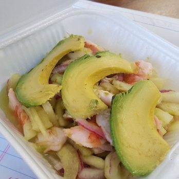 Mariscos San Juanito - a takeout container of a salad - Food Trucks Near Me Mariscos San Juanito - a takeout container of a salad - Food Trucks Near Me