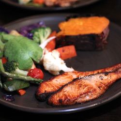 Nancy's Sky Garden - Signature Plate with Grilled Salmon, Baked Sweet Potato, Warm Vegetable Medley + Avocado ($21)