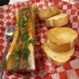 a hot dog with mustard and bread a hot dog with mustard and bread