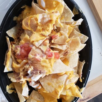 Taco Bell - Not at all hot! Soggy, wilted chips, many small broken chips, with little toppings!! - Fast Food Near Me - Ontario, California