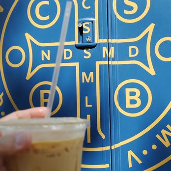 St. Benedict Coffee Company - a hand holding a cup of coffee - Coffee & Tea Near Me - Austin, Texas St. Benedict Coffee Company - a hand holding a cup of coffee - Coffee & Tea Near Me - Austin, Texas
