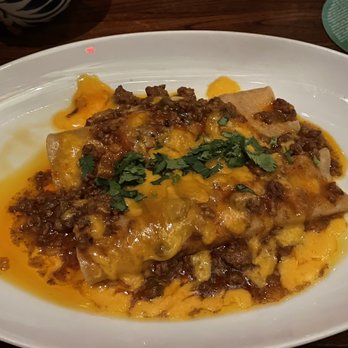 Paloma Suerte - Cheddar and charred onion enchiladas with Chili con carne sauce - Mexican Near Me - Fort Worth, Texas Paloma Suerte - Cheddar and charred onion enchiladas with Chili con carne sauce - Mexican Near Me - Fort Worth, Texas