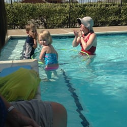 Miss Laura's Swim Lessons - Miss Laura and students do the Hokie Pokie!