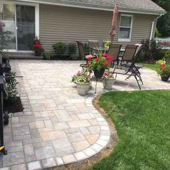 Nice Backyard Paver Patio With Steps Coming Out Sliders With A