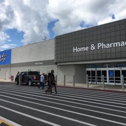 people walking in front of the store