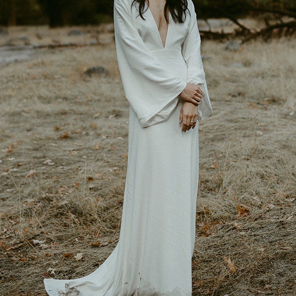 Custom silk wedding gown- got a little wet after a rainy weekend in Yosemite but still loved every inch of it. Custom silk wedding gown- got a little wet after a rainy weekend in Yosemite but still loved every inch of it.