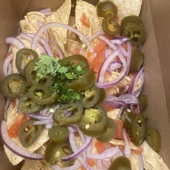 Restoration Pizza - Nachos came with cheese on the side and the flavor of cheese was yum. - Pizza Near Me - Albuquerque, New Mexico