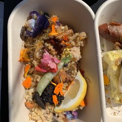 Vegan paella wild morel and chanterelles mushrooms, purple cauliflower