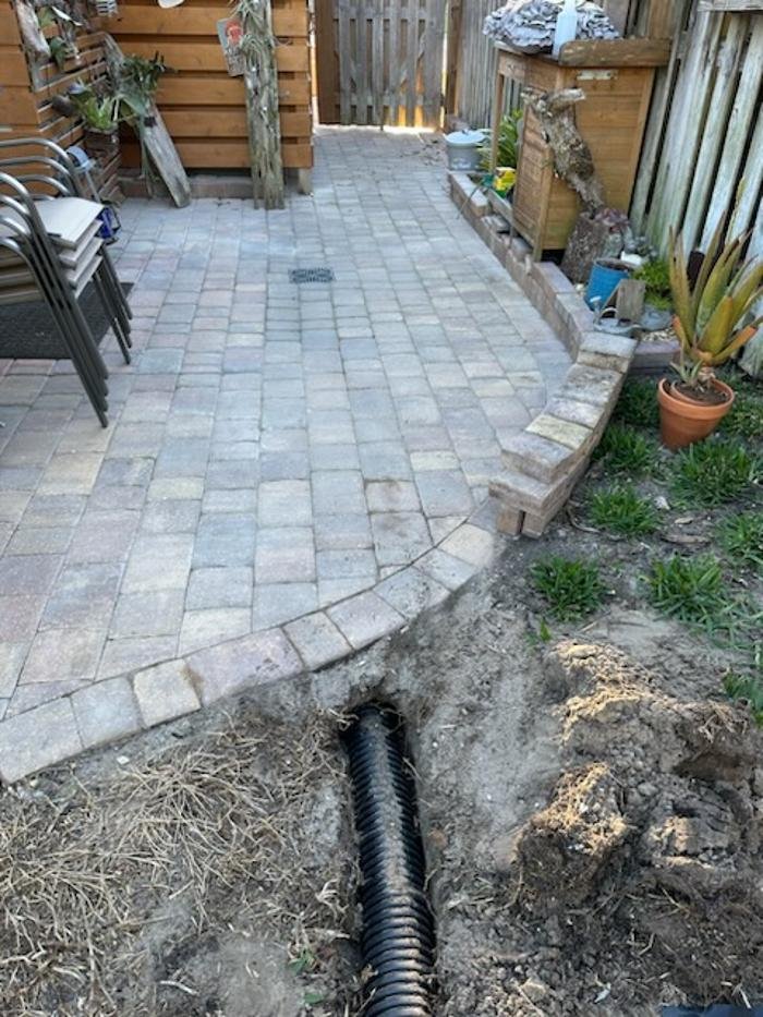 Slide of The French Drain Guys