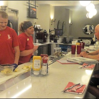 Bernies Diner - My two friendly servers, Andri and Kari, chat with a customer at the counter, who appears to be a local. - Comfort Food Near Me - Billings, Montana
