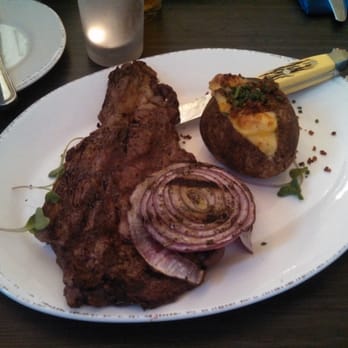 Coalition Restaurant - Rib eye with twice baked mashed potato and grilled onion - Cocktail Bars Near Me - Excelsior, Minnesota