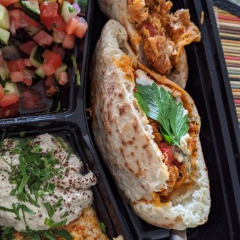 Hummus Kitchen - My chraime salmon"taco" - good spicy kick to it; loaded with salmon! - Middle Eastern Near Me - New York, New York Hummus Kitchen - My chraime salmon"taco" - good spicy kick to it; loaded with salmon! - Middle Eastern Near Me - New York, New York