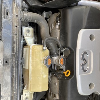 Oil Changers & Repair - coolant all over immediate area and below (not pictured) - Auto Repair Near Me - Austin, Texas Oil Changers & Repair - coolant all over immediate area and below (not pictured) - Auto Repair Near Me - Austin, Texas