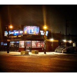 Exterior outside entrance of Tony D's - Tony D's. W Belmont Ave, Elmwood Park, IL Corner Neighborhood Sport Bar. Beers Drinks Great Food Jukebox Slots Sport TVs. Cool! - Elmwood Park, Illinois Exterior outside entrance of Tony D's - Tony D's. W Belmont Ave, Elmwood Park, IL Corner Neighborhood Sport Bar. Beers Drinks Great Food Jukebox Slots Sport TVs. Cool! - Elmwood Park, Illinois