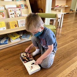 Student B was focused on a book.