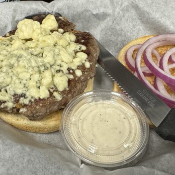 Dooleys - Tombstone garlic burger with blue cheese, sliced onions, and horseradish sauce. - Bars Near Me - Wilkesboro, North Carolina Dooleys - Tombstone garlic burger with blue cheese, sliced onions, and horseradish sauce. - Bars Near Me - Wilkesboro, North Carolina