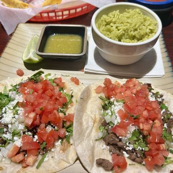 Salsa Street - Two steak tacos with extra tomato. - Mexican Near Me - Palatine, Illinois Salsa Street - Two steak tacos with extra tomato. - Mexican Near Me - Palatine, Illinois