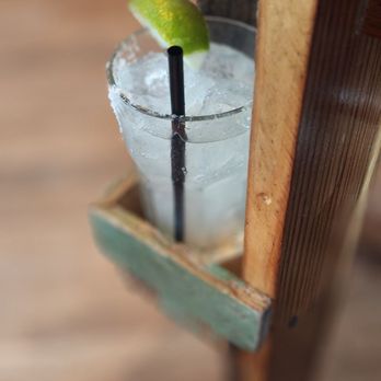 Otto’s Ice House - Margarita. The table we were at had these small pockets that looked as though they're were created to hold a drink. Pretty handy. - Bars Near Me - San Antonio, Texas