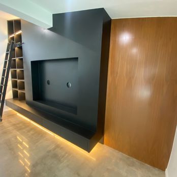CustomBuilt-ins.com - Custom built-in entertainment media center with Wooden Ladder Walnut wall paneling Los Angeles Howell Claremont - Kitchen & Bath Near Me