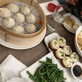 Dumpling Story - Crab & Pork Xiao Long Bao (4) / Juicy Chicken Bao (6) / (6)/ Pork Dumpling with Sesame Sauce & Chili Oil (8) / (8) - Asian Fusion Near Me - San Francisco, California Dumpling Story - Crab & Pork Xiao Long Bao (4) / Juicy Chicken Bao (6) / (6)/ Pork Dumpling with Sesame Sauce & Chili Oil (8) / (8) - Asian Fusion Near Me - San Francisco, California