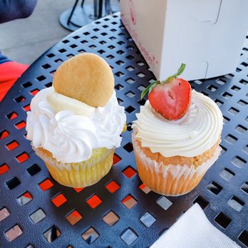 Cupcake Kitchen - two cupcakes on a table - Bakeries Near Me - Chattanooga, Tennessee