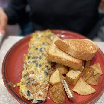 The Paramount - a plate of food with toast and potatoes - Breakfast & Brunch Near Me - Boston, Massachusetts