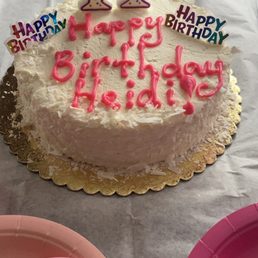 a birthday cake with pink icing a birthday cake with pink icing
